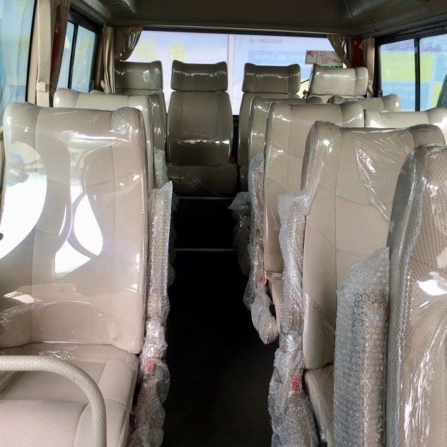 حافلات ديزل كوستر ذات 32 مقعدًا مزودة بتكييف الهواء ونظام التحكم في الجر لنقل آمن للركاب